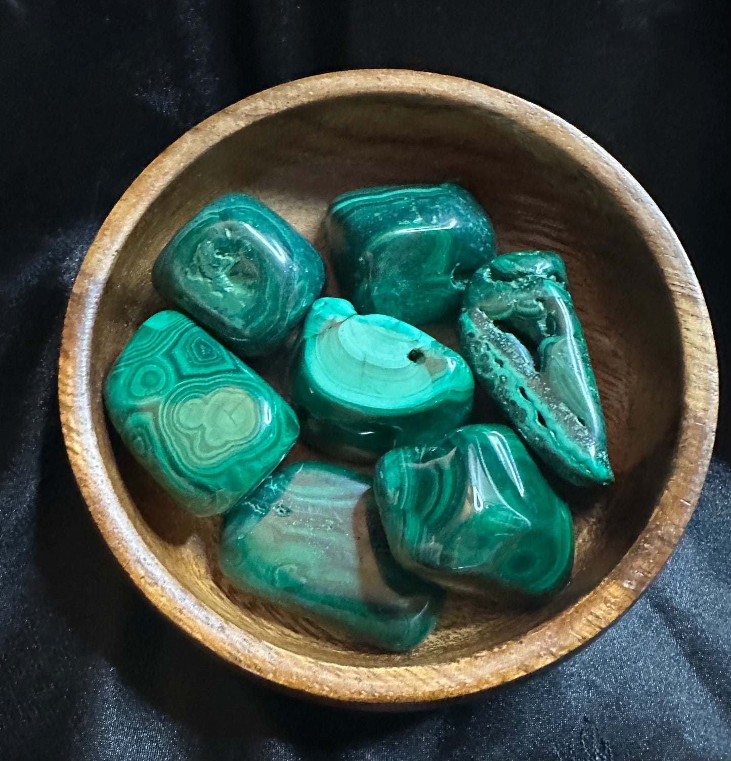 Malachite tumbled stone, from another angle