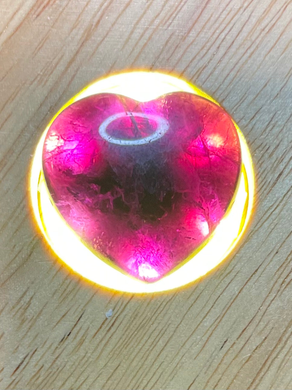 Purple/Rainbow Fluorite crystal heart, a close view of its surface